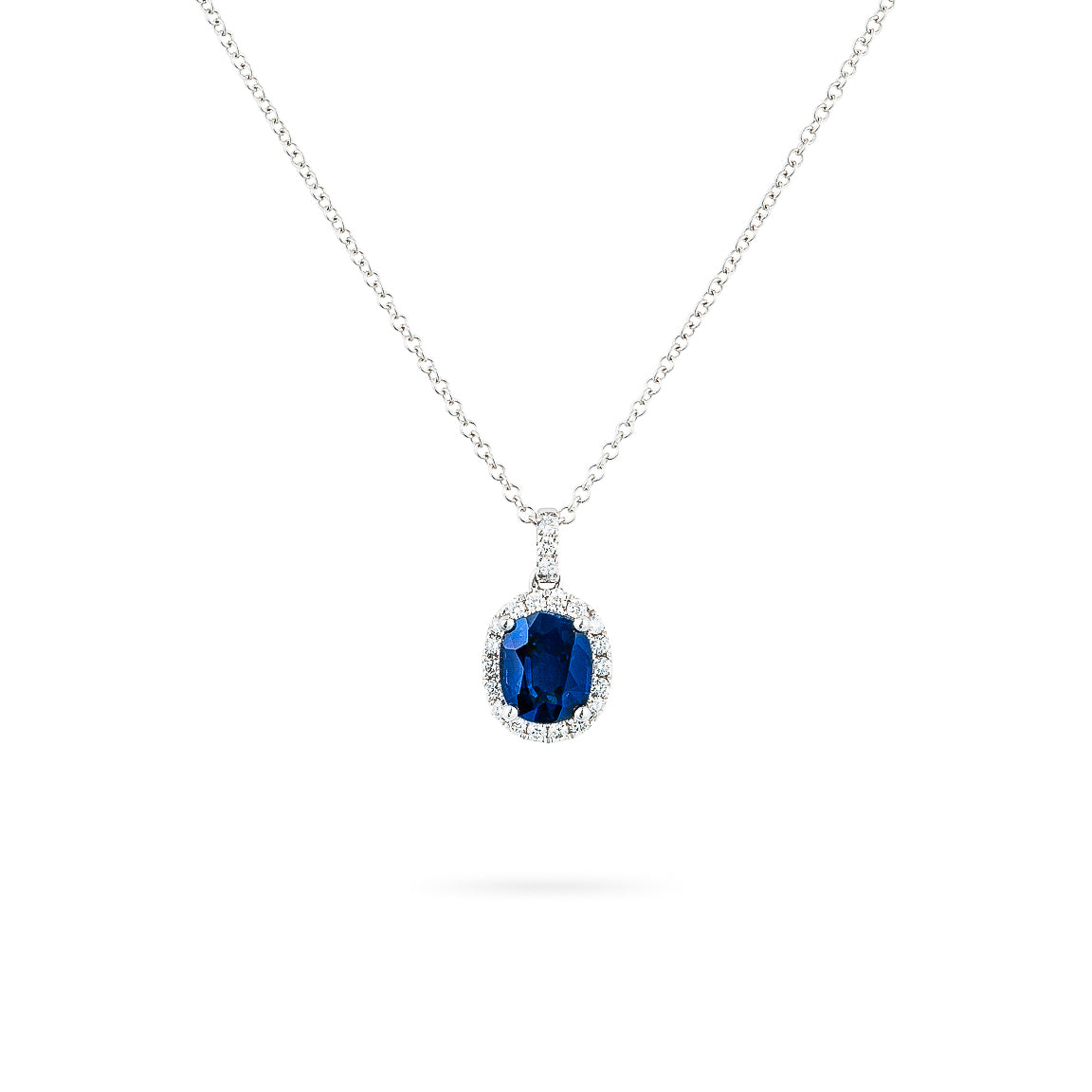 Oval sapphire and halo diamond necklace