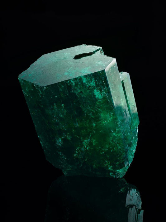 A rough emerald before it has been fashioned. Courtesy of Muzo