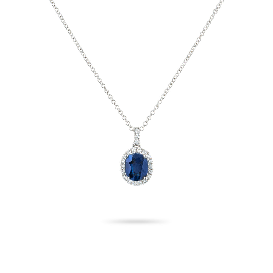 Oval sapphire and halo diamond necklace